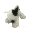 Perro de peluche blanco y negro